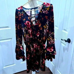 Charlotte Russe Floral velvet romper w big bell sleeves, cross cross opening